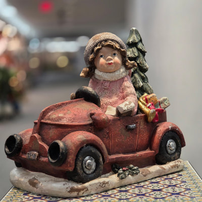 21in. Tall Vintage-Style Girl in Red Truck with Christmas Tree & Gifts
