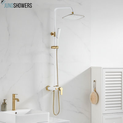 Modern wall-mounted shower system with rainfall showerhead and handheld sprayer combination