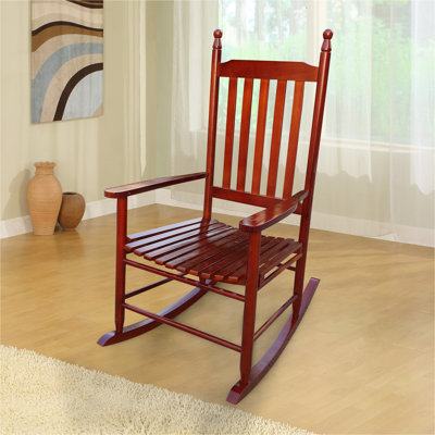 Chaise berçante en bois brun