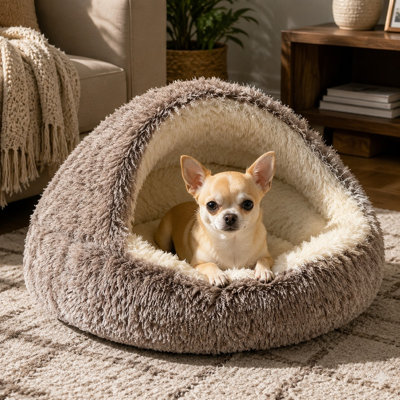 Hooded donut cave bed for cats and small dogs with an adjustable hood opening and a universal cat-and-dog design, offering calming comfort and described as perfect for burrowers.