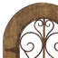 Décoration murale brune à volutes arquées en bois avec volutes en métal bronze