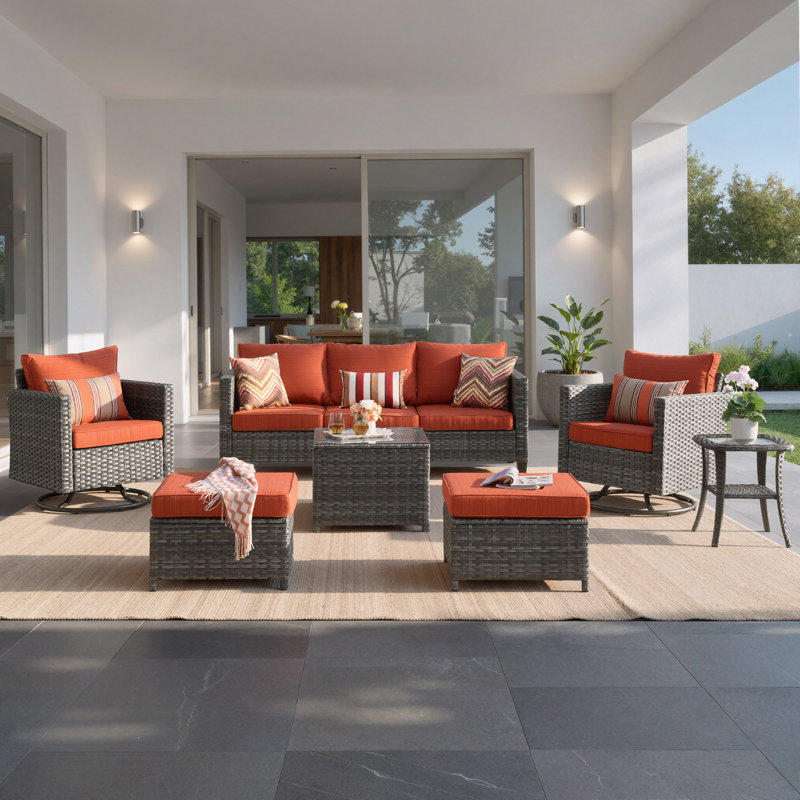 Ensemble de conversation extérieur en résine tressée 7 pièces avec fauteuils à bascule pivotants, poufs, coussins et table basse en verre
