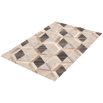 Carelton Cowhide Geometric Indoor Rug