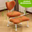 Chaise de bureau ergonomique orange, tissu et métal, idéale pour la méditation