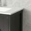 Ce meuble-lavabo moderne noir comprend un lavabo, un éclairage à DEL, deux portes d'armoire à fermeture en douceur et un rangement intégré. Il est sophistiqué, pratique et élégant.