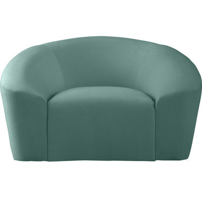 Fauteuil demi-tonneau en velours Alaw