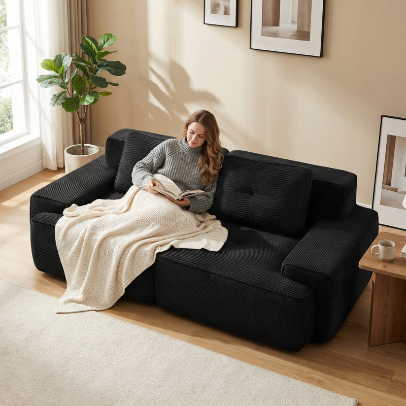 Canapé modulaire rembourré moderne en velours côtelé noir avec assise profonde et capitonné