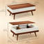 Table basse à plateau relevable avec compartiments cachés et pieds en bois, noyer