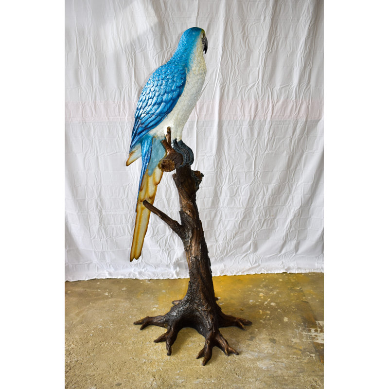 Giant Parrot Standing on a Tree Statue