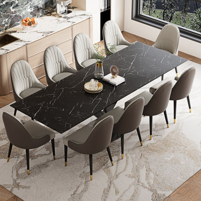 Ensemble de table de salle à manger avec plateau en pierre frittée extensible de 94,5 po et 8 chaises en similicuir