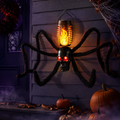 Lampe araignée solaire d'Halloween de 74 cm de large avec flamme vacillante et pattes articulées