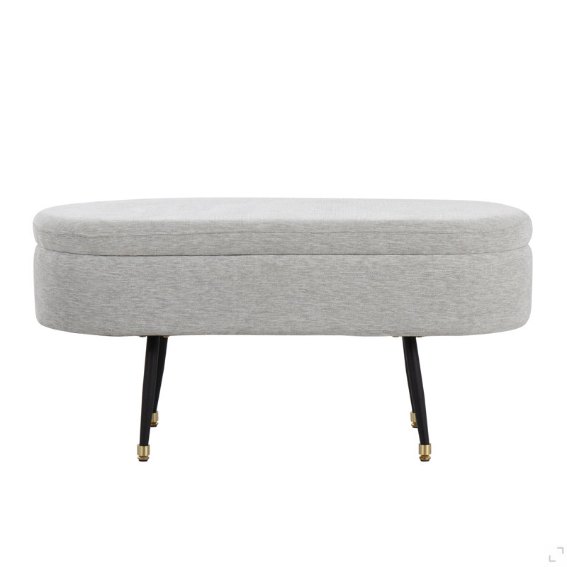 Banc de rangement contemporain en métal noir et tissu gris clair avec accent en métal doré