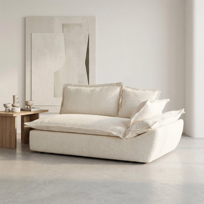 Canapé-lit modulaire blanc avec accoudoirs à gauche et canapé-lit modulaire en chenille