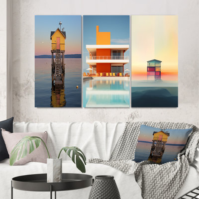 «Coastal Minimalisme, bâtiment jaune dans l'eau», 3 pièces