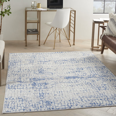 Tapis abstrait en polypropylène tissé à la machine en ivoire / bleu