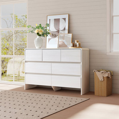 Commode moderne à 7 tiroirs avec coins courbés et conception à devant affleurant, armoire de rangement minimaliste pour chambre à coucher ou salon