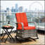Fauteuil inclinable d'extérieur en rotin avec coussins moelleux et repose-pieds réglable, parfait pour la détente sur le patio