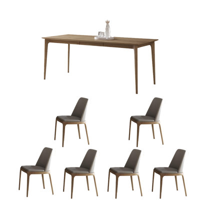 La table de salle à manger est rectangulaire simple et moderne