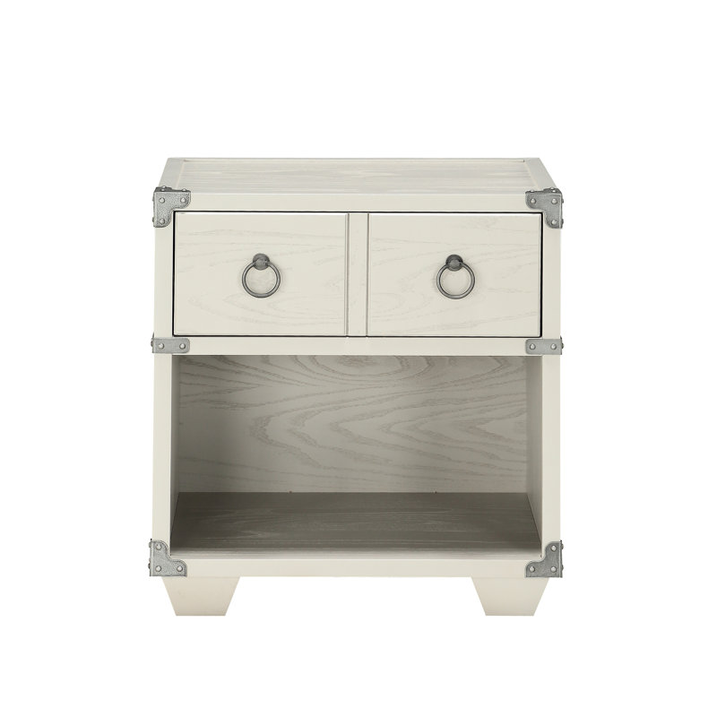 Table de chevet grise avec des matériaux et une touche moderne dans un mouvement de pieds lisse