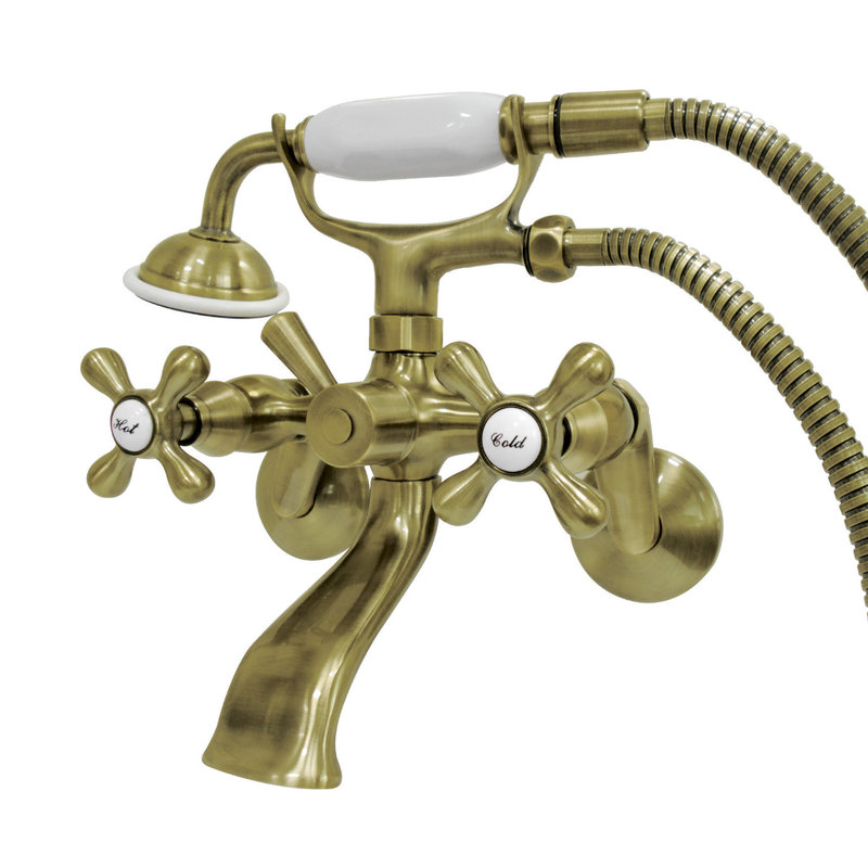 Robinet de baignoire sur pattes à deux poignées et à deux trous avec pomme de douche à main Kingston Brass, Vintage Brass
