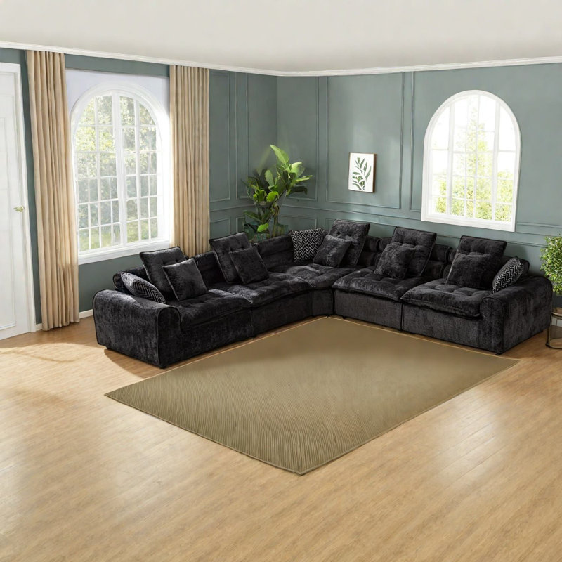 Canapé d'angle modulaire surdimensionné en boucle noire, idéal pour un salon familial., Noir
