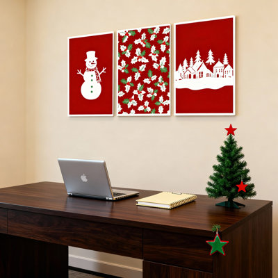 Tableau sur toile tendue représentant un bonhomme de neige, un motif de houx et un village d'hiver (ensemble de 3)