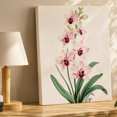 Toile, un arrangement délicat d'orchidées roses présentant de multiples fleurs avec art mural