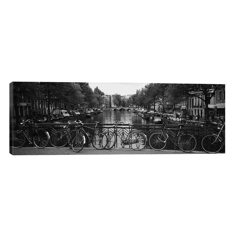 Bicycle Leaning Against A Metal Railing On A Bridge, Amsterdam, Netherlands - Wrapped Canvas Panoramic Print