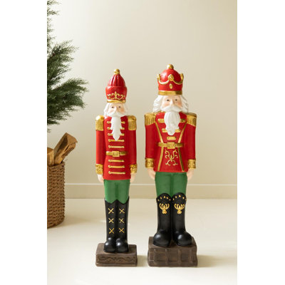 SET OF TWO FAUX CONCRETE CHRISTMAS SOLDIERS