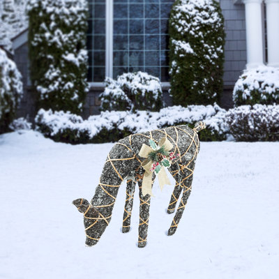 Rattan Grazing Reindeer with Bow and LED Lights, 27"