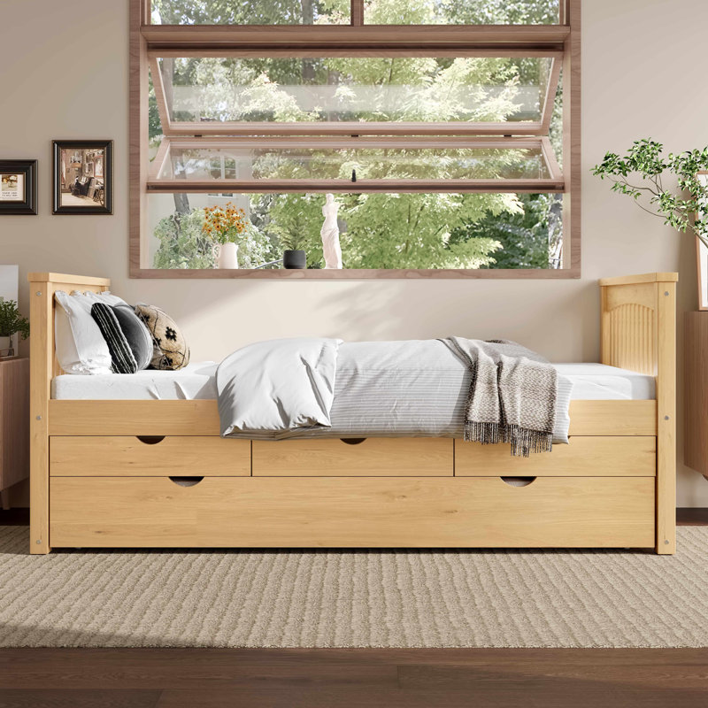 Lit simple en bois facile à ranger avec finition naturelle, idéal pour les pièces modernes