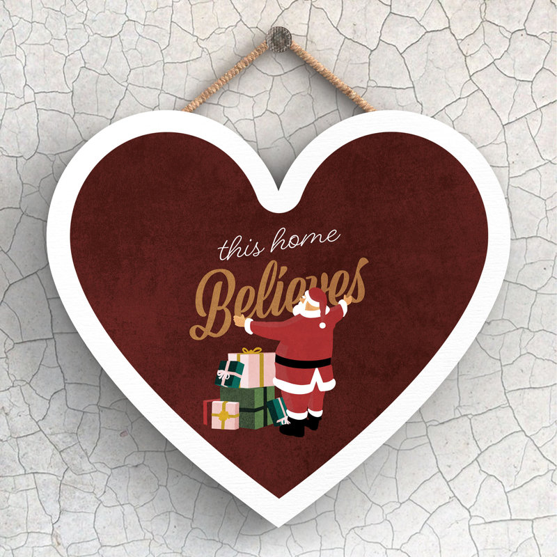 Xmas This Home Believes Santa Wooden Heart Plaque, 16cm H x 17cm W x 0.9cm D