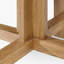 Table de salle à manger ronde en bois massif de style contemporain avec quatre pieds et un plateau en bois naturel pour 6 sièges