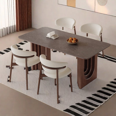 Ensemble de table et chaises de salle à manger avec dalle de roche.