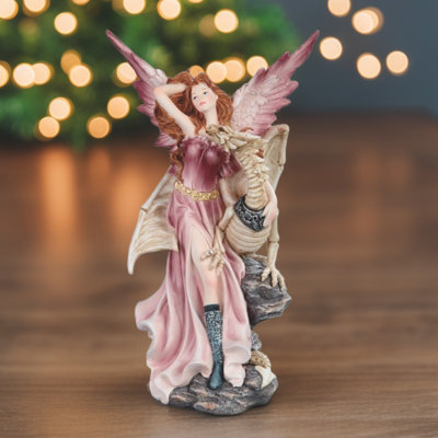 11.5"H Fairy with Drgon Skeleton Figurine