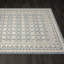 Tapis floral gris en polypropylène tissé à la machine-70812187