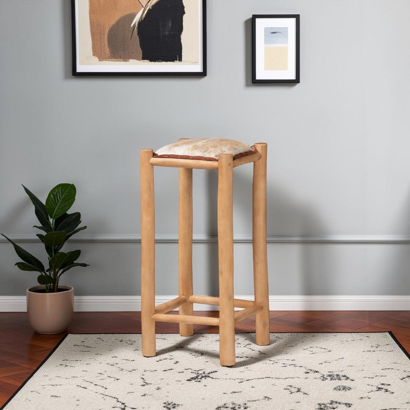Tabouret de bar Atara rustique avec revêtement en cuir de chèvre authentique et structure en bois de teck