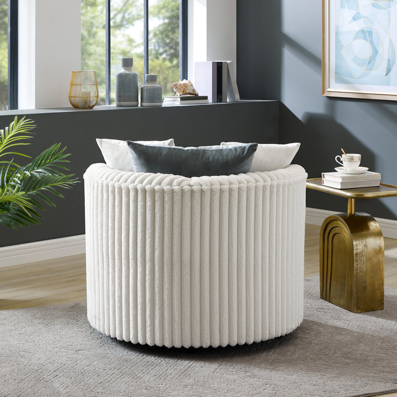 Fauteuil contemporain en velours côtelé à roulettes, pour une maison élégante et confortable grâce à son revêtement à larges côtes.
