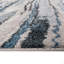 Tapis tissé à rayures abstraites