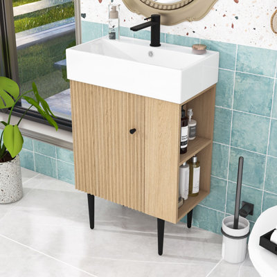 Ensemble de meuble-lavabo de salle de bain avec lavabo en céramique, rangement à droite et pieds dorés