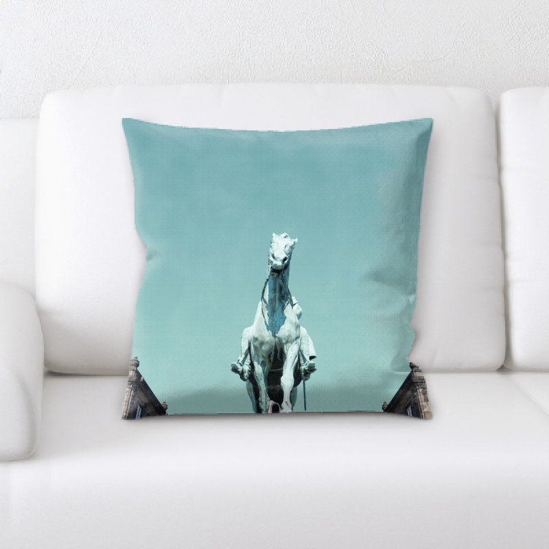 Coussin statue