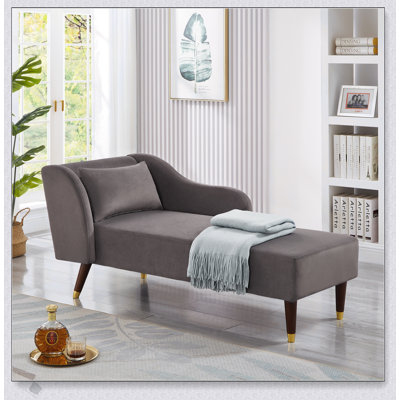 Chaise longue moderne avec revêtement en velours, confort luxueux et design élégant pour toute maison