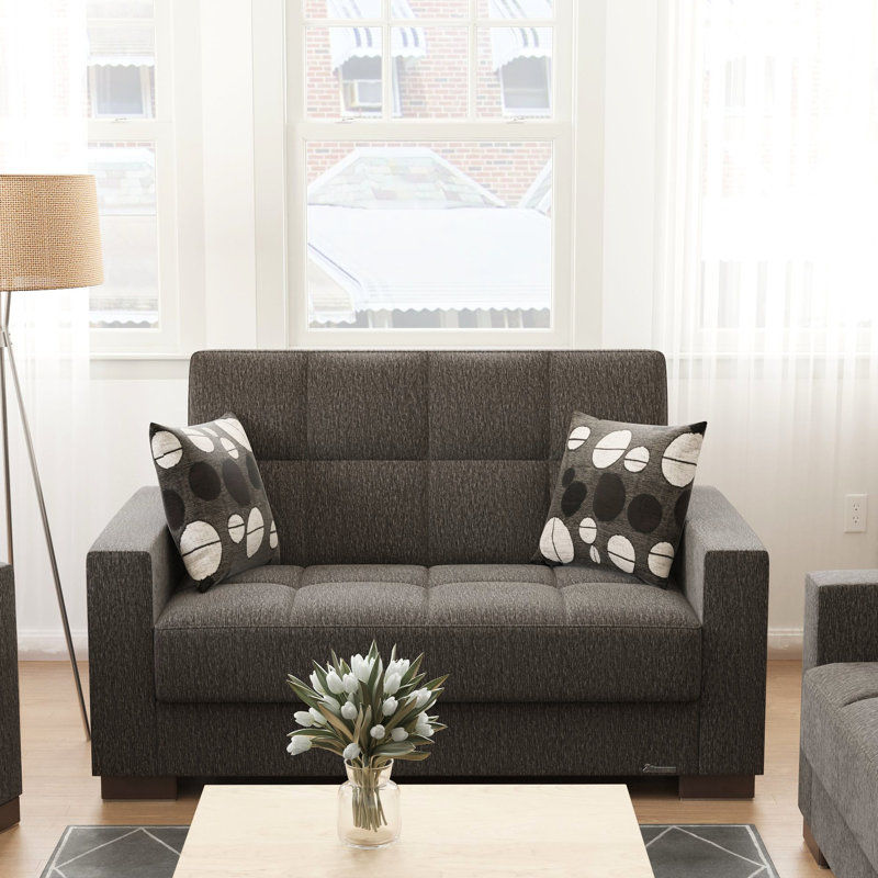 Chenille convertible grise avec rangement. Structure. 37,04 po de hauteur. Mobilier fonctionnel. Utilisation polyvalente. 36,64 de largeur. Qualité. Apparence élégante