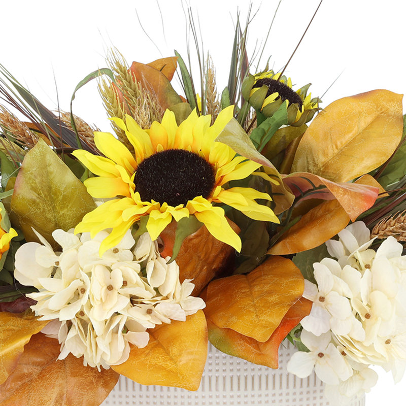 Arrangement floral Linneus avec tournesols et hortensias