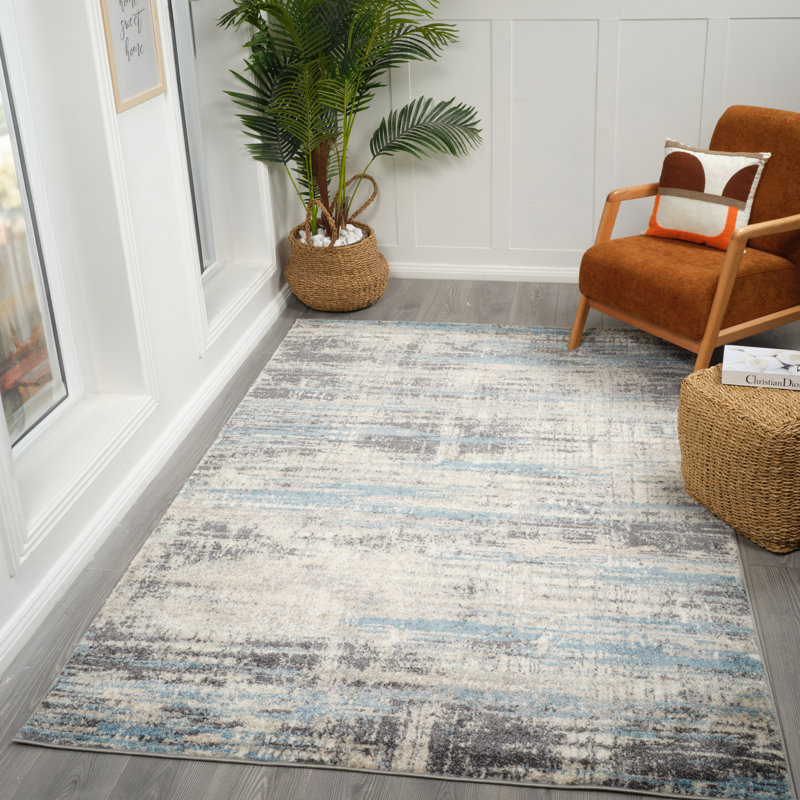 Tapis bleu tissé à la machine Mackensy, Rectangle 7 pi 11 po x 9 pi 9 po