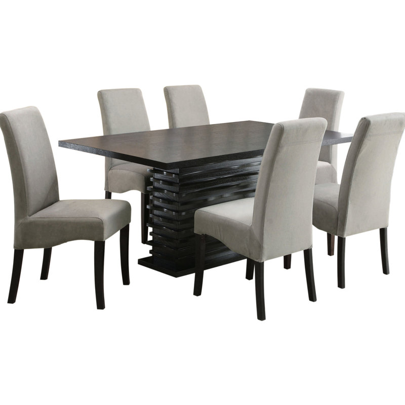 7 chaises grises et noires avec table à piédestal rectangulaire et chaises évasées à dossier évasé pour tissu sculptural