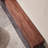 Light luxury black walnut TV cabinet