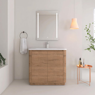 Meuble-lavabo sur pied 36/40 po avec lavabo en céramique et portes à fermeture en douceur