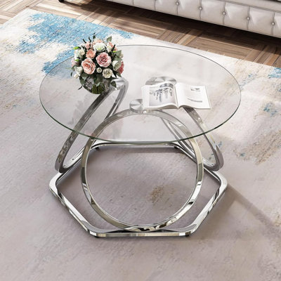 Table basse moderne en verre avec base hexagonale, plateau rond en verre trempé et structure en métal chromé pour le salon et le bureau