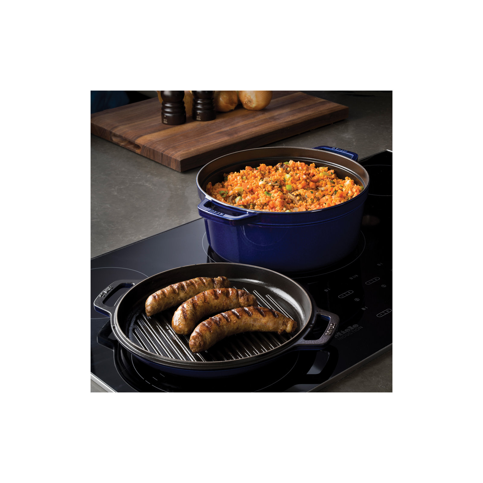 Staub Cast Iron 7 Qt. Cast Iron Round Dutch Oven, Dark Blue